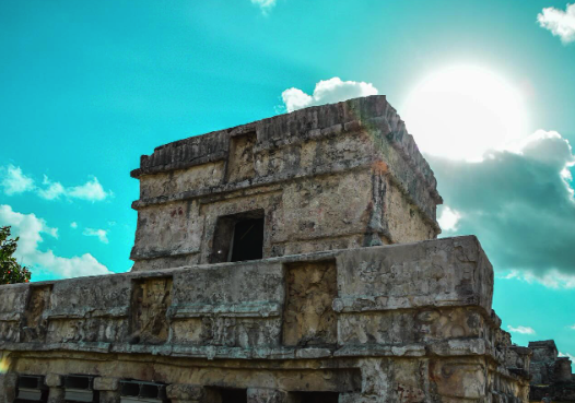 Tulum temple against a turquoise sky